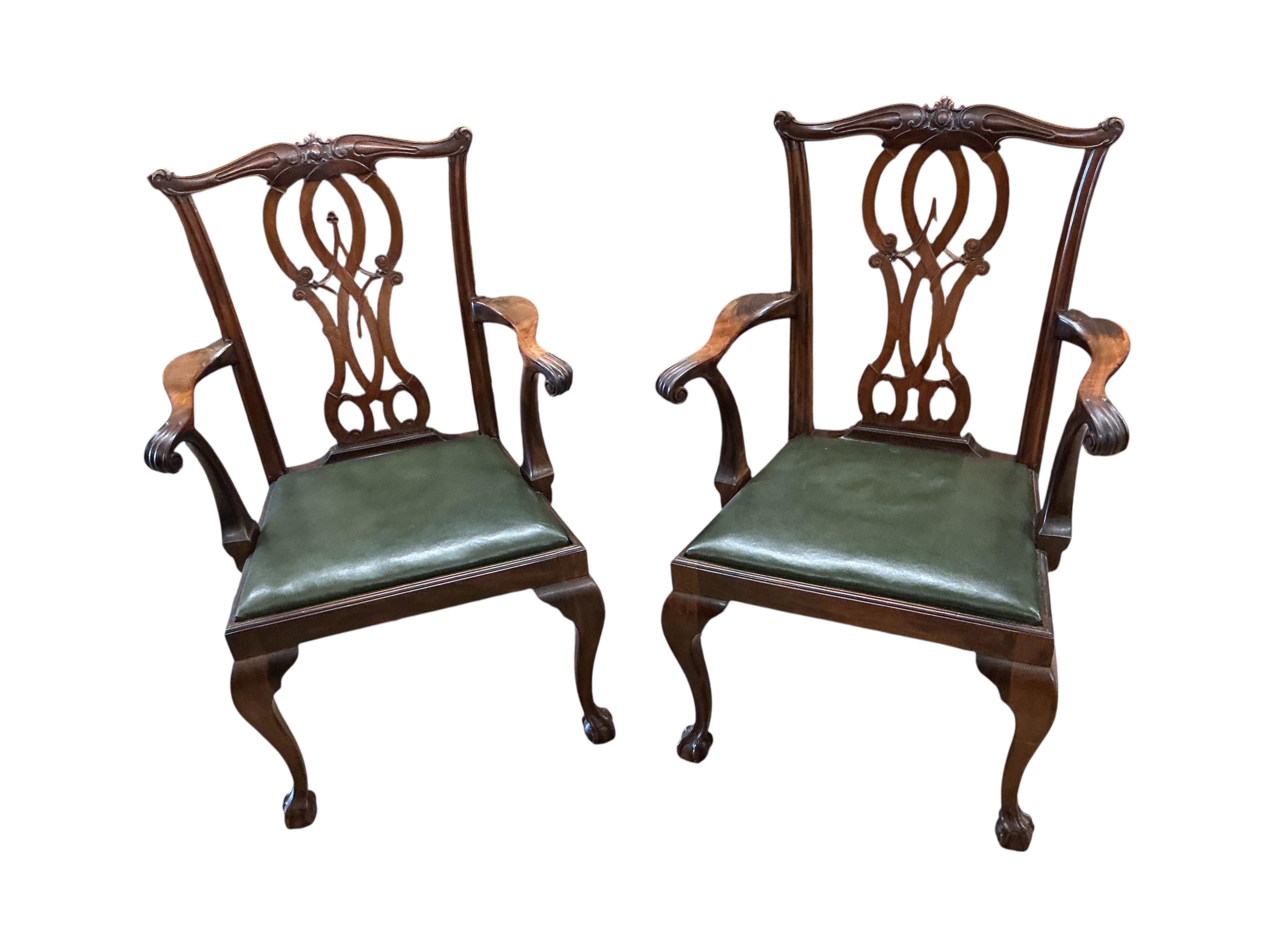 A set of nine Chippendale Revival mahogany dining chairs, two with arms